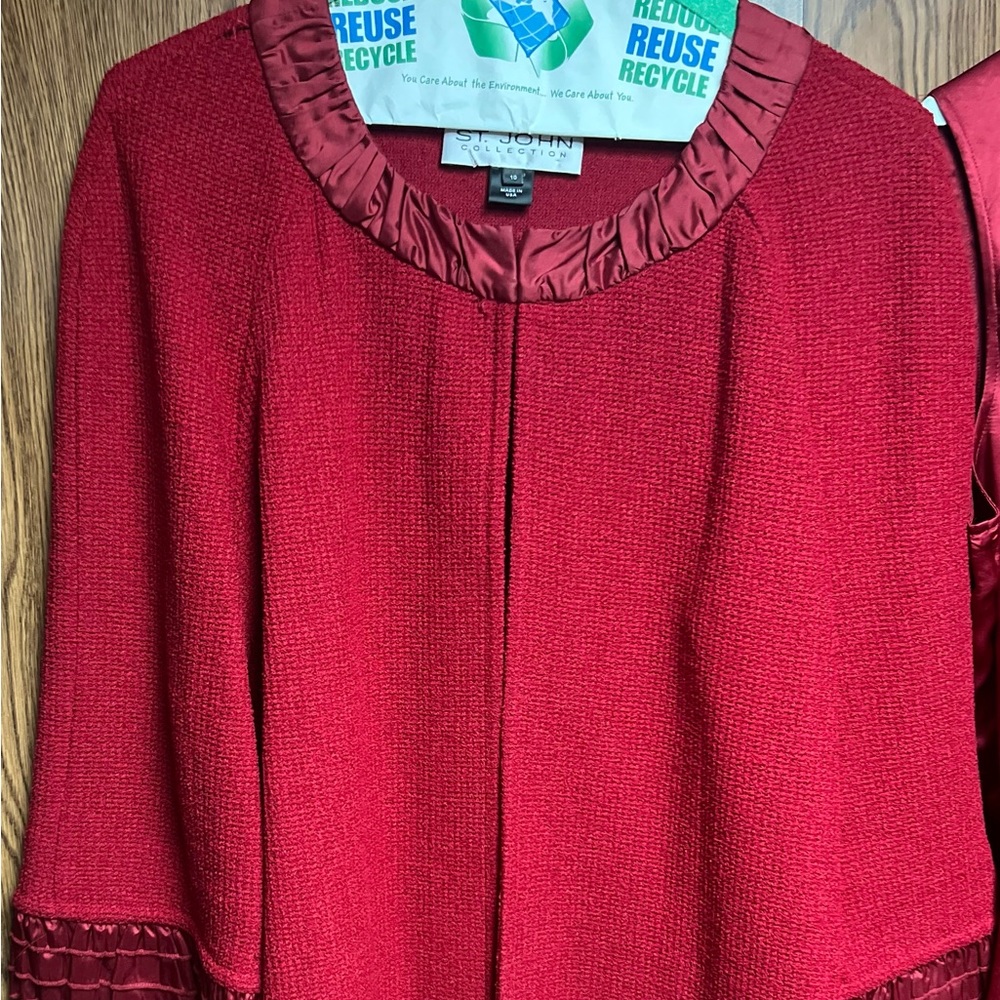 Crimson (red) St. John Jacket with ruffles.  Excellent condition and no flaws.